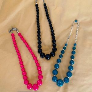 Pink, Black and Teal Ball Necklaces.